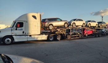2012 FREIGHTLINER CASCADIA & 7 CAR HAULER